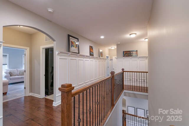 3666 Jacinta Ct, Tega Cay, SC 29708 - hall with an upstairs landing, wood finished floors, arched walkways, and recessed lighting