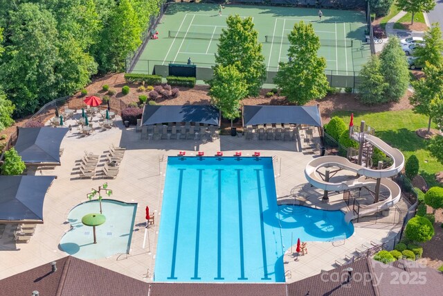 3666 Jacinta Ct, Tega Cay, SC 29708 - community pool with a water slide and a patio area