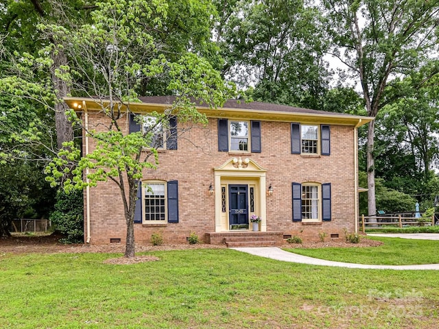 1049 Regency Dr, Charlotte, NC 28211 - colonial-style house with crawl space and brick siding