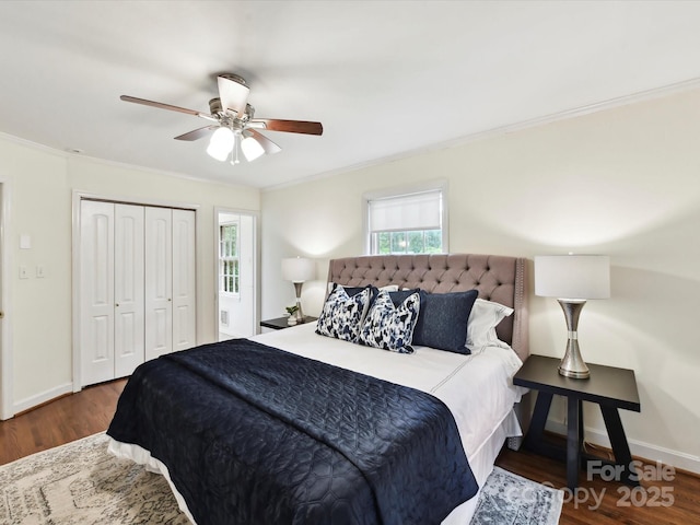 1049 Regency Dr, Charlotte, NC 28211 - bedroom featuring ornamental molding, wood finished floors, baseboards, a closet, and ceiling fan