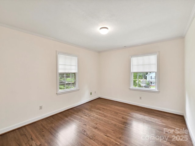 1049 Regency Dr, Charlotte, NC 28211 - unfurnished room featuring ornamental molding, wood finished floors, and baseboards