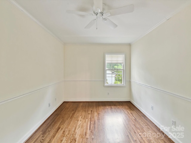 1049 Regency Dr, Charlotte, NC 28211 - spare room with ornamental molding, wood finished floors, baseboards, and a ceiling fan