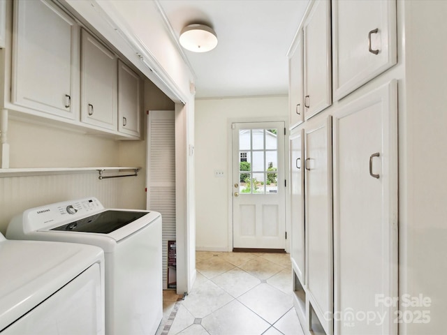 1049 Regency Dr, Charlotte, NC 28211 - laundry area with cabinet space, separate washer and dryer, and light tile patterned floors