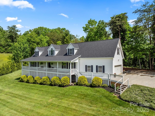642 Bull Creek Rd, Mars Hill, NC 28754 - cape cod-style house with a porch, driveway, and a front yard