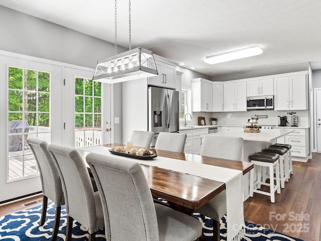642 Bull Creek Rd, Mars Hill, NC 28754 - dining space with dark wood finished floors