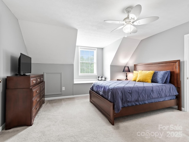 642 Bull Creek Rd, Mars Hill, NC 28754 - bedroom featuring light carpet, lofted ceiling, baseboards, and a ceiling fan
