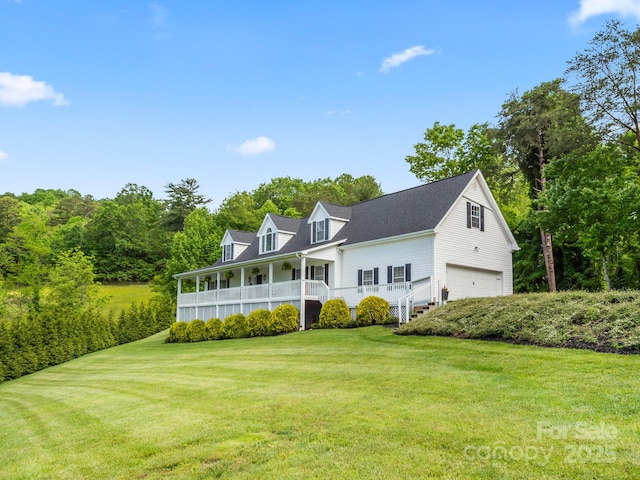 642 Bull Creek Rd, Mars Hill, NC 28754 - new england style home with covered porch, a front lawn, and an attached garage