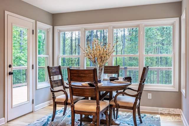 206 Ridge Top Dr, Connelly Springs, NC 28612 - dining room with baseboards, plenty of natural light, and light wood finished floors