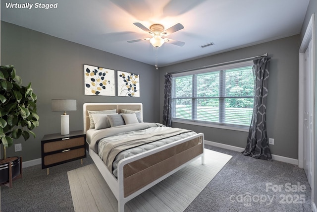 206 Ridge Top Dr, Connelly Springs, NC 28612 - carpeted bedroom featuring baseboards and a ceiling fan