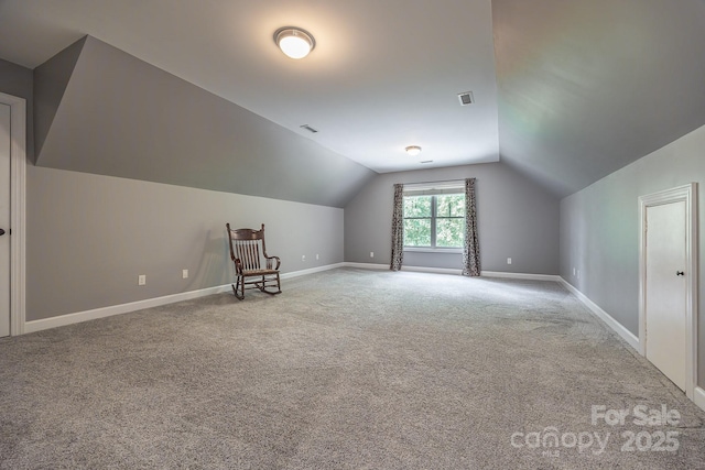 206 Ridge Top Dr, Connelly Springs, NC 28612 - bonus room with light carpet, vaulted ceiling, and baseboards
