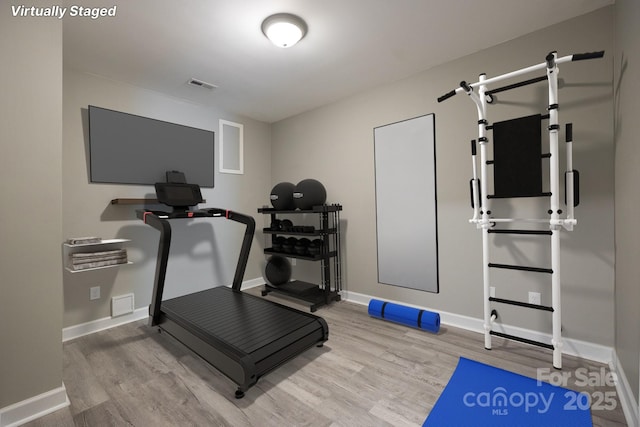 206 Ridge Top Dr, Connelly Springs, NC 28612 - exercise room with wood finished floors and baseboards