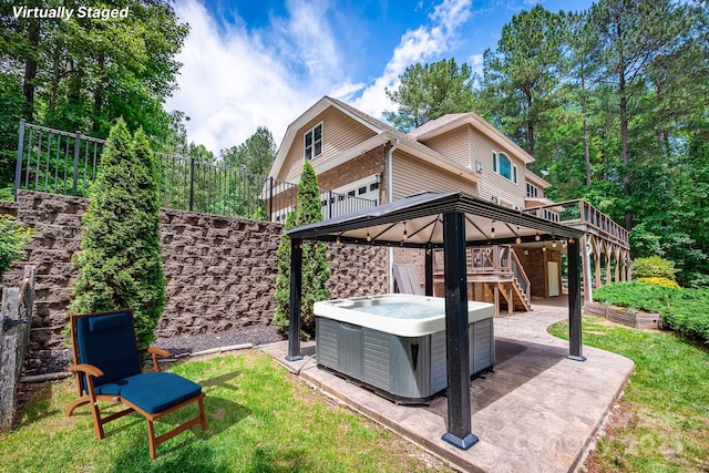 206 Ridge Top Dr, Connelly Springs, NC 28612 - view of grassy yard with a hot tub, stairway, a patio area, and a wooden deck