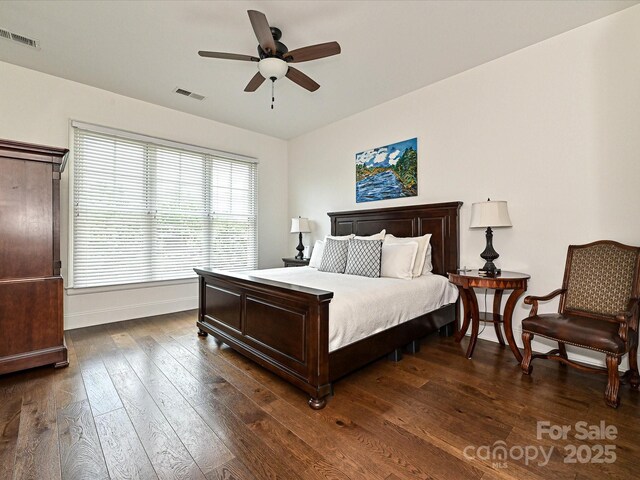 5425 Closeburn Rd, Charlotte, NC 28210 - bedroom featuring dark wood-style flooring, baseboards, and a ceiling fan