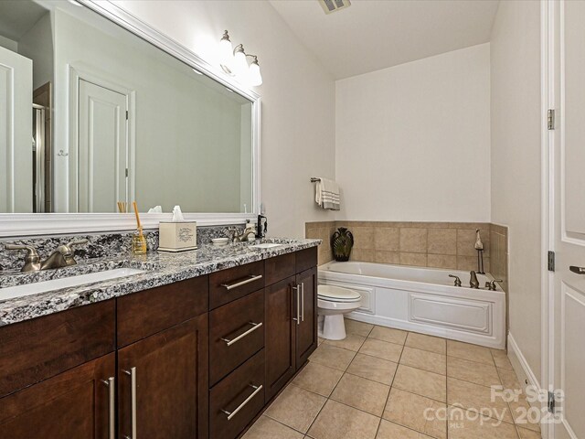 5425 Closeburn Rd, Charlotte, NC 28210 - bathroom with tile patterned flooring, double vanity, a garden tub, toilet, and a stall shower