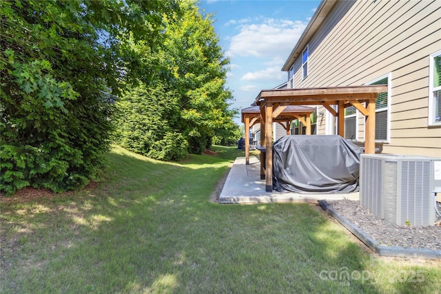 4935 Norman Park Pl, Clover, SC 29710 - view of grassy yard featuring a gazebo, central air condition unit, and a patio area