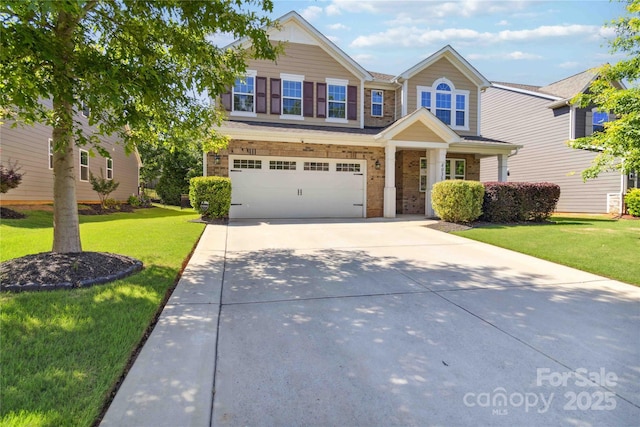 4935 Norman Park Pl, Clover, SC 29710 - view of front facade with driveway, a garage, a front yard, and brick siding