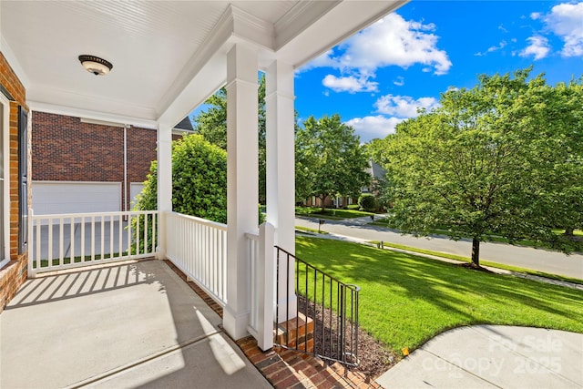 10024 Hazelview Dr, Charlotte, NC 28277 - covered porch with a yard and an attached garage