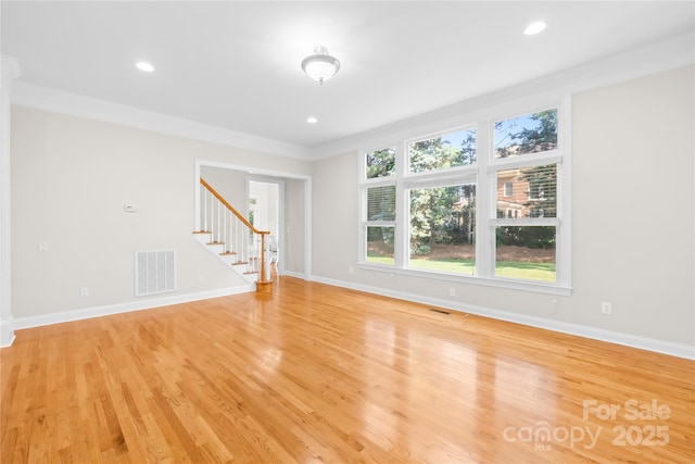10024 Hazelview Dr, Charlotte, NC 28277 - unfurnished room with stairway, crown molding, light wood-type flooring, baseboards, and recessed lighting