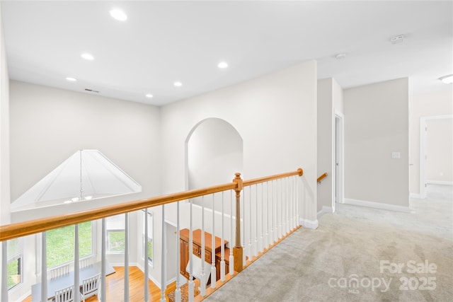 10024 Hazelview Dr, Charlotte, NC 28277 - hallway with an upstairs landing, recessed lighting, baseboards, and carpet floors