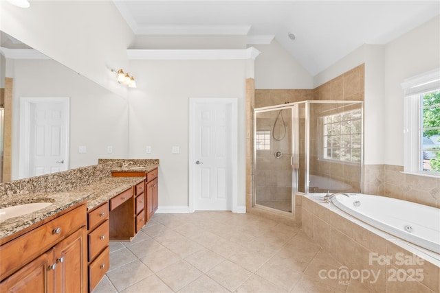 10024 Hazelview Dr, Charlotte, NC 28277 - full bathroom featuring a shower stall, a garden tub, tile patterned flooring, double vanity, and lofted ceiling