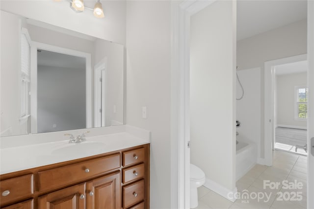 10024 Hazelview Dr, Charlotte, NC 28277 - bathroom featuring tile patterned floors, toilet, vanity, shower / bath combination, and baseboards