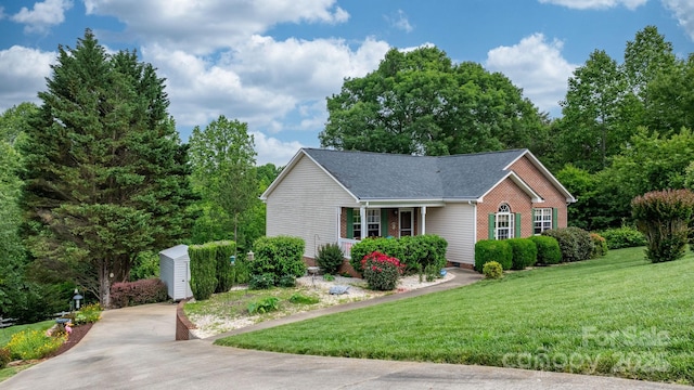 215 Taylor Cir, Granite Falls, NC 28630 - view of front of house with a front lawn and roof with shingles