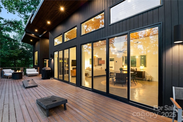 7 Big Rocky Top Dr, Weaverville, NC 28787 - wooden terrace with an outdoor living space with a fire pit