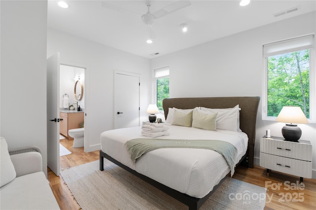7 Big Rocky Top Dr, Weaverville, NC 28787 - bedroom featuring light wood-style flooring, ensuite bathroom, recessed lighting, and a ceiling fan