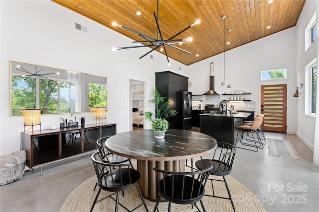 7 Big Rocky Top Dr, Weaverville, NC 28787 - dining area with finished concrete flooring, wooden ceiling, a chandelier, high vaulted ceiling, and recessed lighting