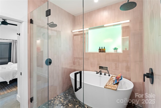 7 Big Rocky Top Dr, Weaverville, NC 28787 - full bath featuring ensuite bath, a shower stall, tile walls, and a freestanding tub