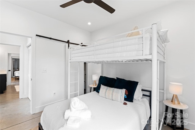 7 Big Rocky Top Dr, Weaverville, NC 28787 - bedroom with a barn door, ceiling fan, and recessed lighting