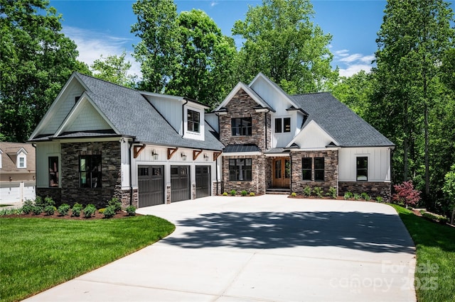 7703 Juniper Ln, Denver, NC 28037 - craftsman-style home featuring stone siding, driveway, a shingled roof, a front yard, and board and batten siding