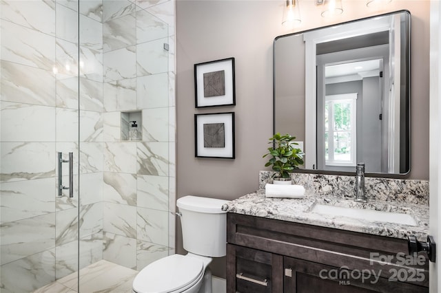 7703 Juniper Ln, Denver, NC 28037 - full bathroom featuring a stall shower, toilet, and vanity