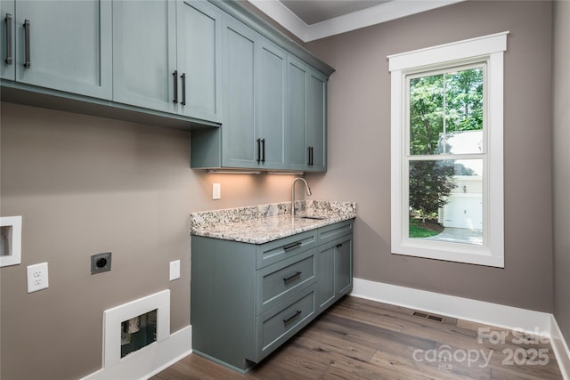 7703 Juniper Ln, Denver, NC 28037 - laundry room featuring cabinet space, electric dryer hookup, dark wood-type flooring, and baseboards