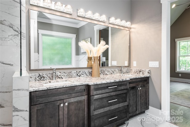 7703 Juniper Ln, Denver, NC 28037 - bathroom featuring marble finish flooring, double vanity, baseboards, and crown molding