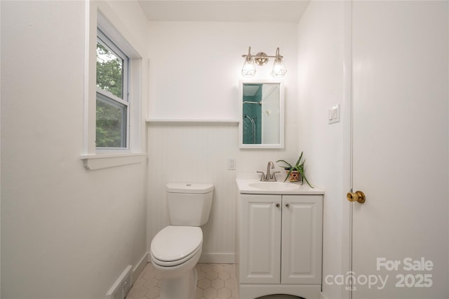 12 Canterbury Rd, Asheville, NC 28805 - bathroom featuring vanity, toilet, and tile patterned floors