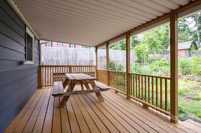 12 Canterbury Rd, Asheville, NC 28805 - wooden terrace with outdoor dining area