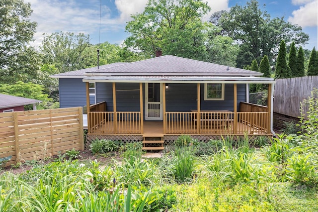 12 Canterbury Rd, Asheville, NC 28805 - back of property with a shingled roof and a chimney