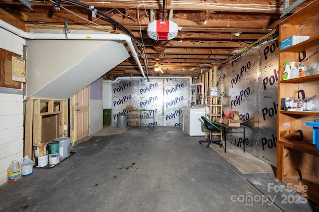12 Canterbury Rd, Asheville, NC 28805 - unfinished basement featuring washer / dryer and a workshop area