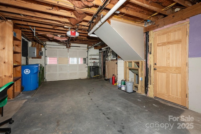 12 Canterbury Rd, Asheville, NC 28805 - garage with a garage door opener and electric panel