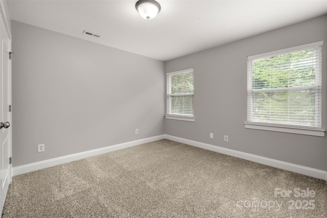 14034 Cedar Pond Cir, Huntersville, NC 28078 - spare room featuring carpet flooring and baseboards