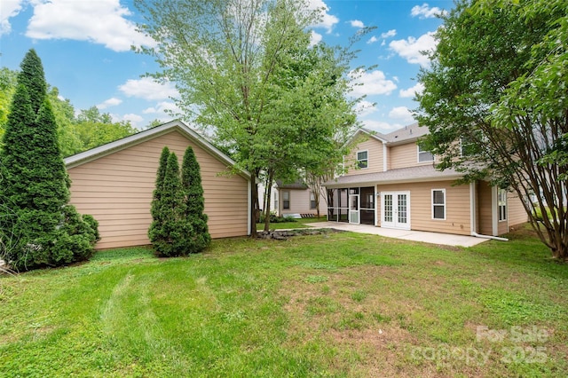 14034 Cedar Pond Cir, Huntersville, NC 28078 - view of green lawn featuring french doors, a patio area, and a sunroom