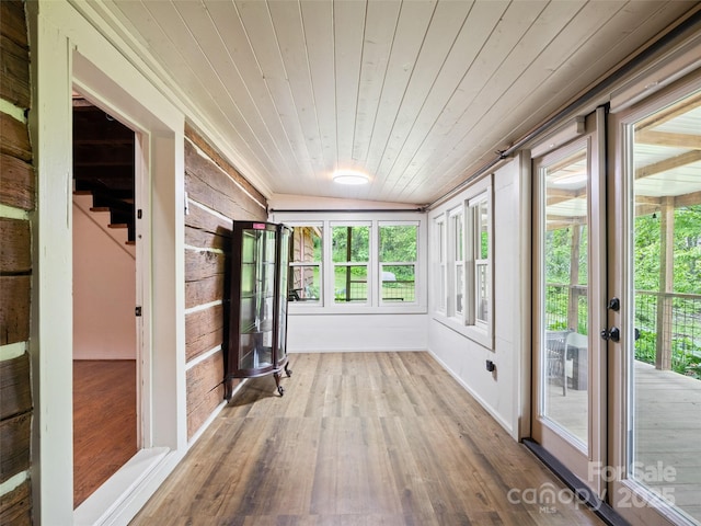 161 Moody Mountain Rd, Burnsville, NC 28714 - unfurnished sunroom with french doors, wood finished floors, wooden ceiling, and wood walls