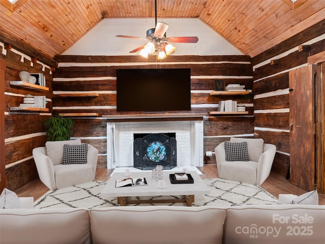161 Moody Mountain Rd, Burnsville, NC 28714 - living room with wood ceiling, wood walls, wood finished floors, vaulted ceiling, and a ceiling fan