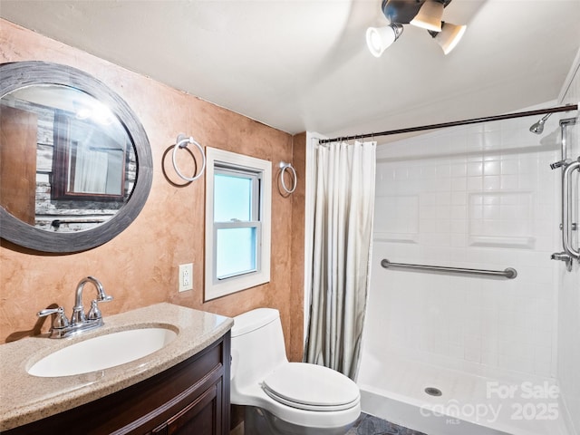 161 Moody Mountain Rd, Burnsville, NC 28714 - bathroom featuring toilet, a tile shower, and vanity