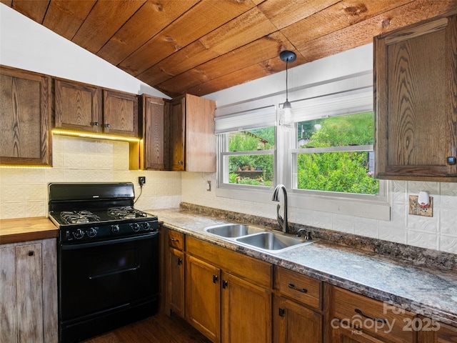 161 Moody Mountain Rd, Burnsville, NC 28714 - kitchen featuring black gas stove, lofted ceiling, a sink, wooden ceiling, and decorative backsplash