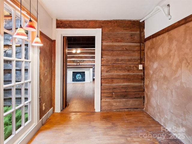 161 Moody Mountain Rd, Burnsville, NC 28714 - empty room featuring wood finished floors and wooden walls