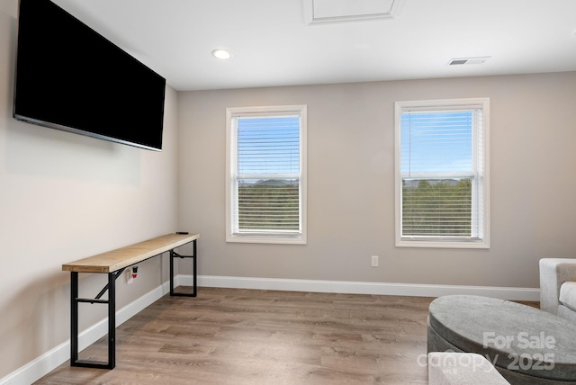 2242 Bear Creek Rd, Leicester, NC 28748 - sitting room featuring wood finished floors, plenty of natural light, baseboards, and recessed lighting