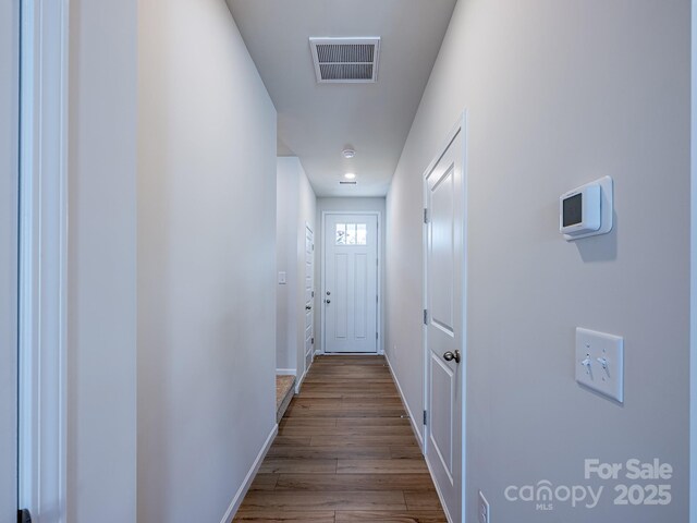 2541 Ruby Dixon Crossing Dr Unit 18, Gastonia, NC 28056 - hall with dark wood-type flooring and baseboards