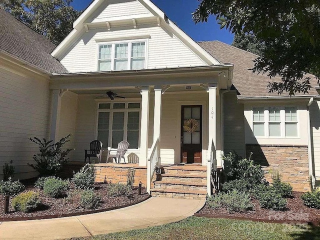 view of front of property with covered porch and ceiling fan